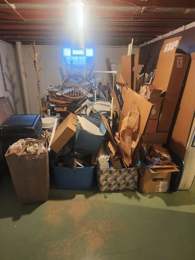 Roll-off dumpster container at job site for 4 Yard Dumpster Rental in Berthoud